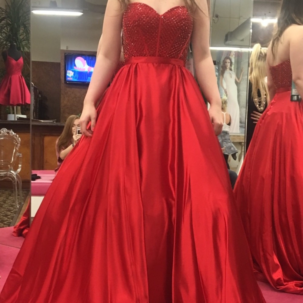 RED SHERRY HILL BALL GOWN